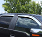 Black toyota 4runner suv with avs chrome vent visors parked in lot