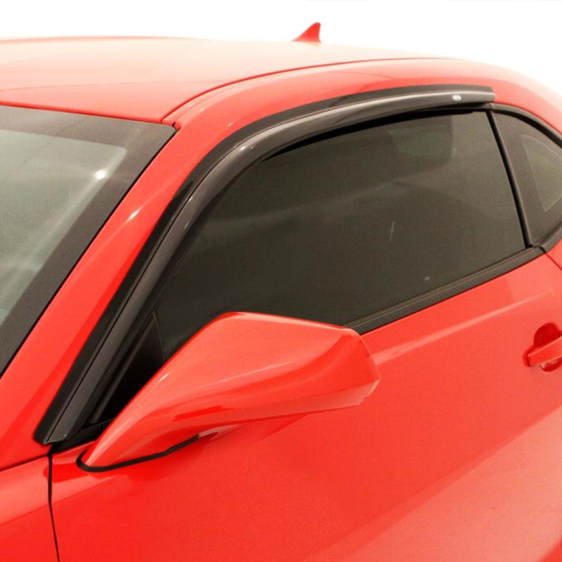 Red car benefiting from avs original ventvisor window deflectors for fresh air