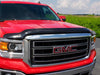 Avs bugflector ii hood shield in smoke color on a red truck in parking lot