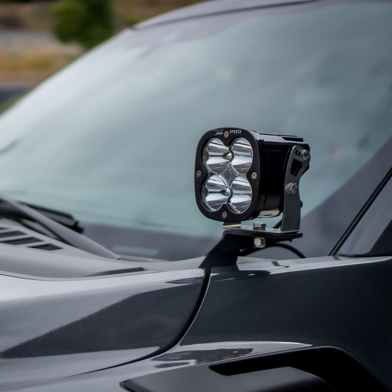 Close-up of baja designs 2021+ ford raptor xl sport a-pillar kit with light on car