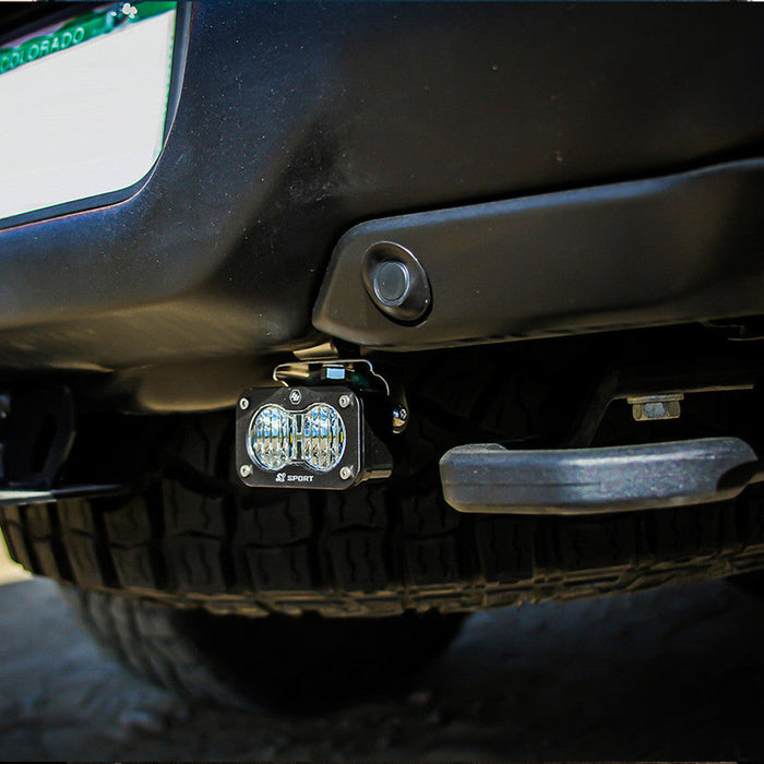 Close up of car with license plate on a baja designs 2021+ ram trx 1500 s2 dual reverse kit