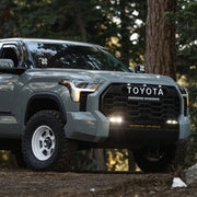 2020 Toyota Tundra parked in woods - Baja Designs S2 SAE OEM Fog Light Replacement Kit