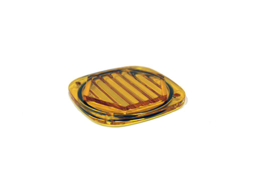 Yellow glass knob with round shape on baja designs s1 headlight lens kit amber wide cornering