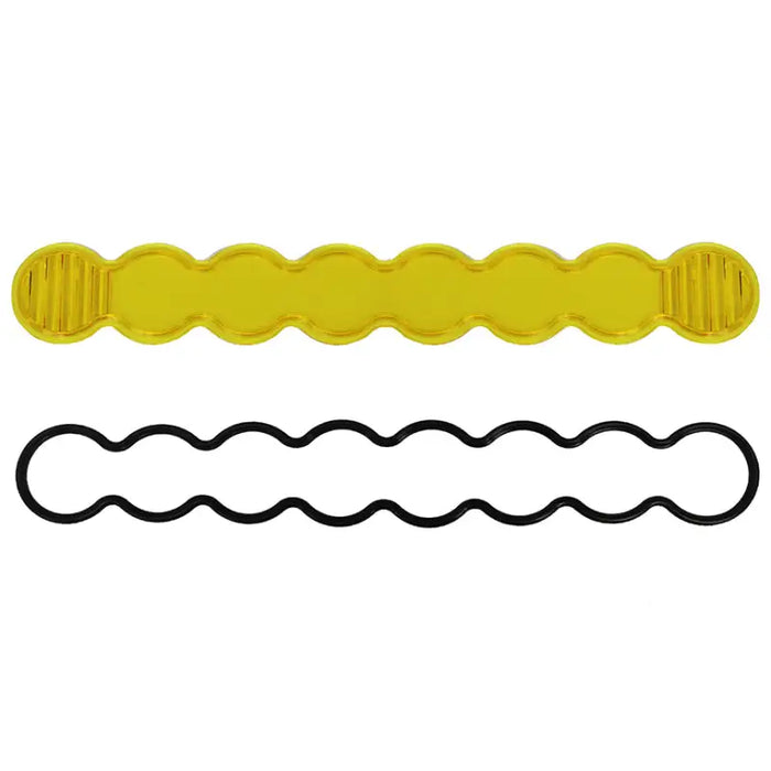 Yellow plastic hair clips against white background