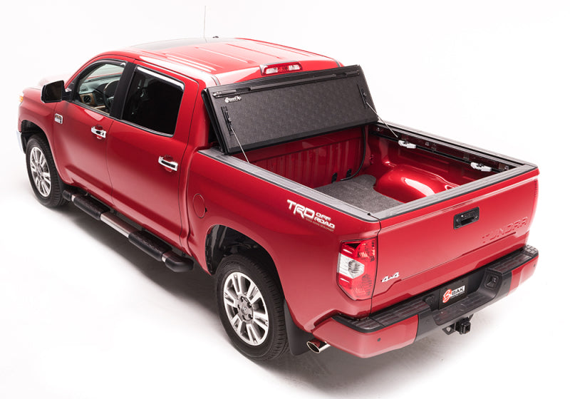 Red truck with black bed cover - bakflip g2 for toyota tundra double cab 6ft 2in bed