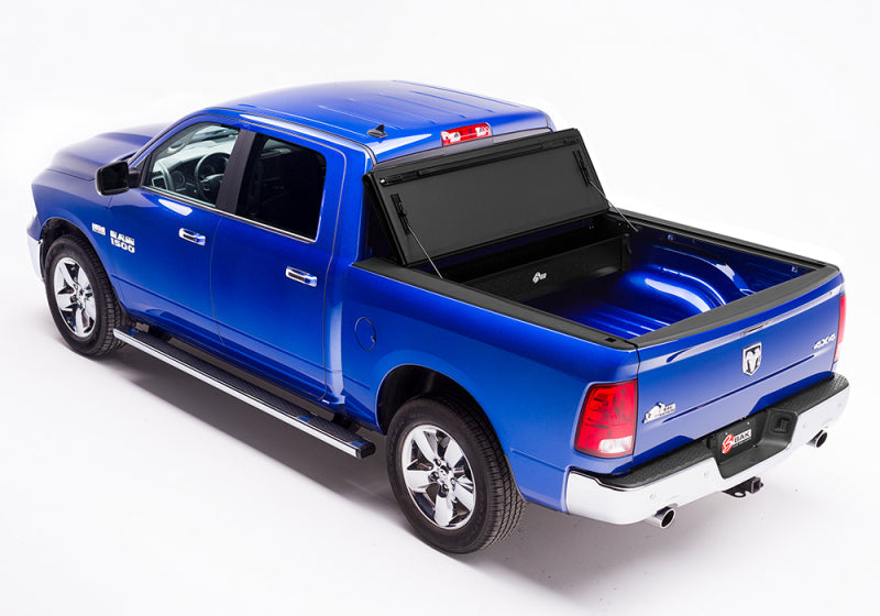 Blue truck with black bed cover - bakflip mx4 matte finish for dodge ram/ ram 2500/3500 8ft bed