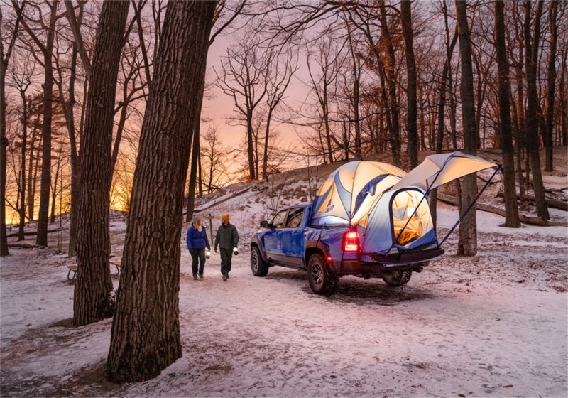 Car parked in woods with tent on top, installing bakflip mx4 matte finish product