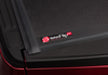 Red ford f-150 truck bed with open door, bakflip g2