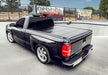 Black truck parked in a lot, bak 04-14 ford f-150 5ft 6in bed bakflip g2