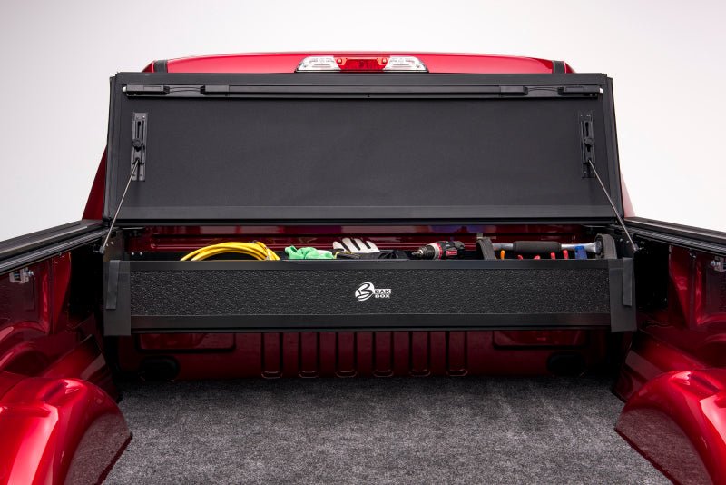 Trunk compartment of a red car - bakflip mx4 installation instructions