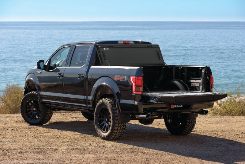 Ford f-150 truck parked on rocky beach showcasing bakflip mx4 matte finish