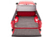 Red toyota tundra with bakflip g2 - rear view