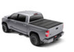 Toy car with red light on back displayed in bak 07-20 toyota tundra 5ft 6in bed bakflip mx4 matte finish