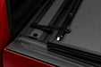 Red car rear door open - bakflip mx4 on toyota tundra