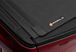 Red toyota tundra revolver x4s bed cover side view