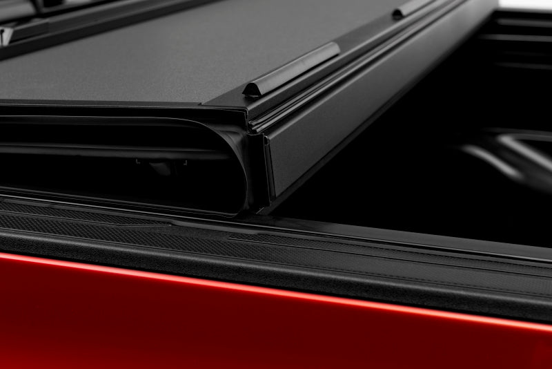 Red car rear end view, bakflip mx4 matte finish for toyota tundra with oe track system