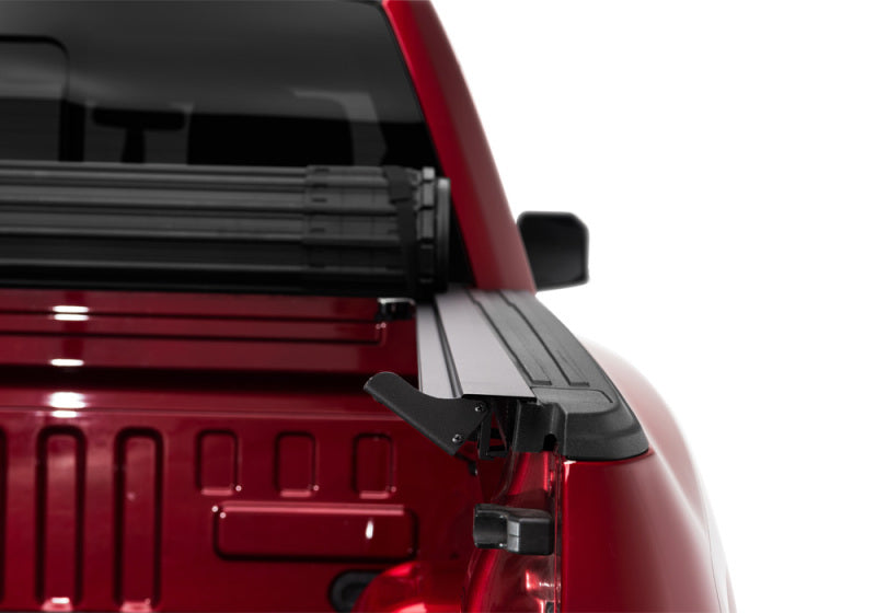 Red truck with black roof rack - bak revolver x4s bed cover for toyota tundra with oe track system