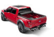 Red toy truck on white background, bak revolver x4s 6.7ft bed cover for toyota tundra