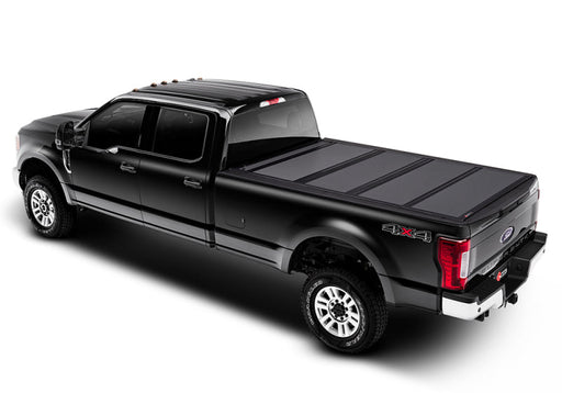 Ford super duty truck with sleek black bakflip mx4 bed cover