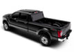 Black toy car with red tail displayed on bak 08-16 ford super duty 8ft bed bakflip mx4 matte finish
