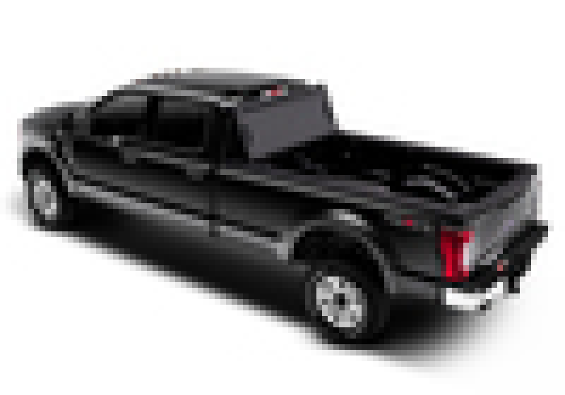 Black toy car with red tail displayed on bak 08-16 ford super duty 8ft bed bakflip mx4 matte finish