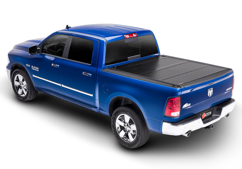 Blue truck with black bed cover bak 09-18 dodge ram 1500 bakflip g2