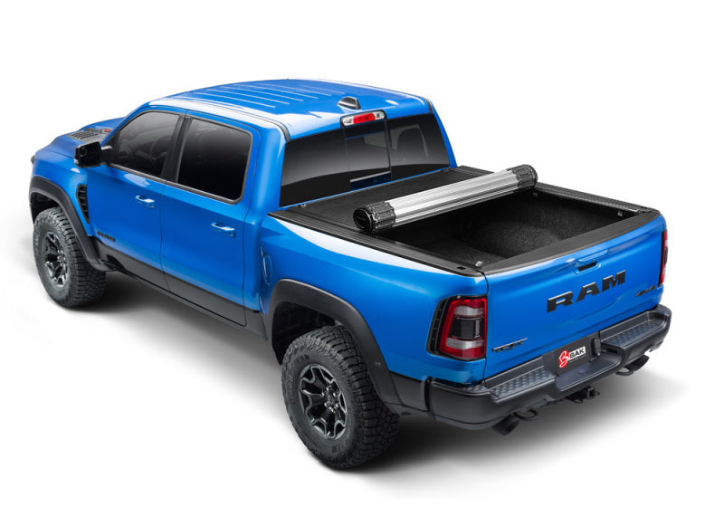 Blue truck with black bed cover - bak revolver x2 for 6ft 4in truck bed installation step