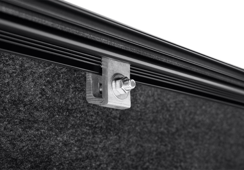 Close up of a door handle on a truck bed with revolver x2 system