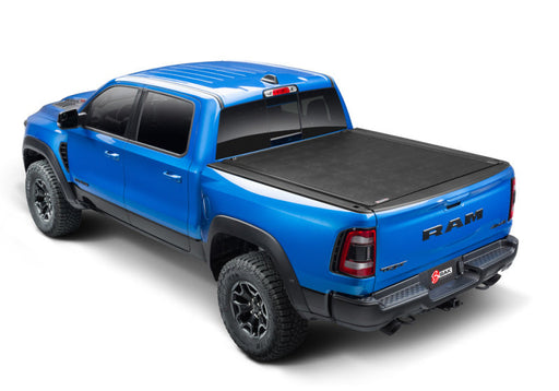 Blue truck with black bed cover - bak revolver x2 for 6ft 4in truck bed installation