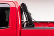 Side view of red truck installed with bakflip mx4 matte finish on chevy silverado 1500/2500/3500 5ft 8in