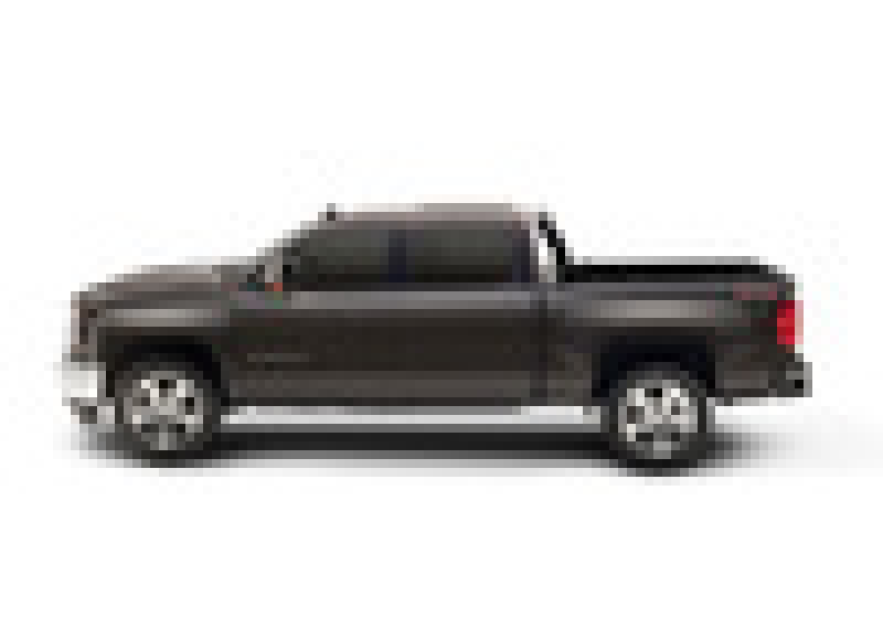 Black chevy silverado truck with red tail in 5ft 8in truck bed bakflip g2 installation