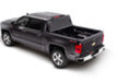 Black toy car with red light on top, compatible with bak 14-18/15-20 chevy silverado truck bed