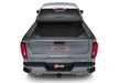 Gray gmc truck with bak revolver x4s bed cover