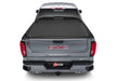 Rear view of a gmc truck with bak 2014-18 chevy silverado/gm sierra/2019 legacy revolver x4s bed cover