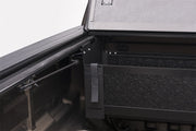 Black and white printer machine installed in a bak 15-20 chevy colorado/gmc canyon 5ft bed bakflip g2 truck bed