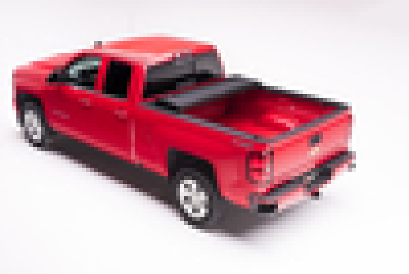 Red toy car on white background, showcasing bakflip mx4 matte finish for chevy colorado/gmc canyon