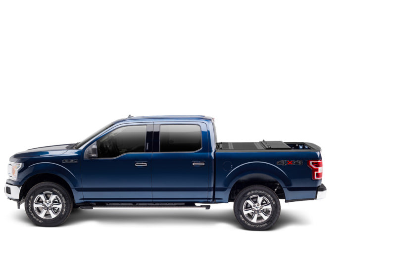 Blue truck with white background and bak 15-20 ford f-150 5ft 6in bed bakflip fibermax product