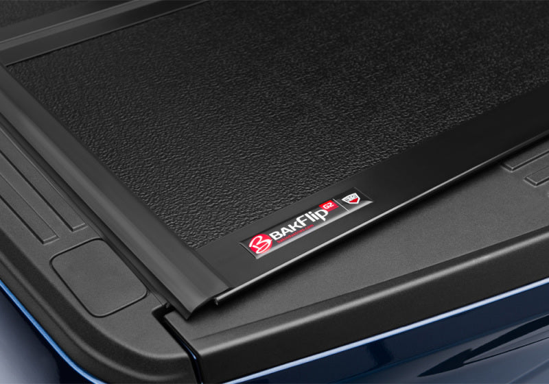 Black luggage case on side of bakflip g2 for ford f-150 truck bed