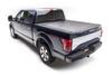 Black and white ford f-150 revolver x2 truck bed cover with red light