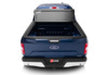 Blue ford f-150 truck bed rear view: bakflip g2