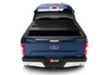 Rear view of blue truck bed cover bak 15-20 ford f-150 bakflip g2