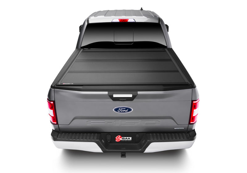 Gray ford truck rear end with bak 15-20 ford f-150 mx4 bed cover
