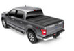 Black truck with red tail light featuring bak 15-20 ford f-150 6ft 6in bed bakflip mx4 matte finish