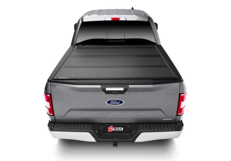 Gray ford f-150 truck bed cover with matte finish by bakflip mx4