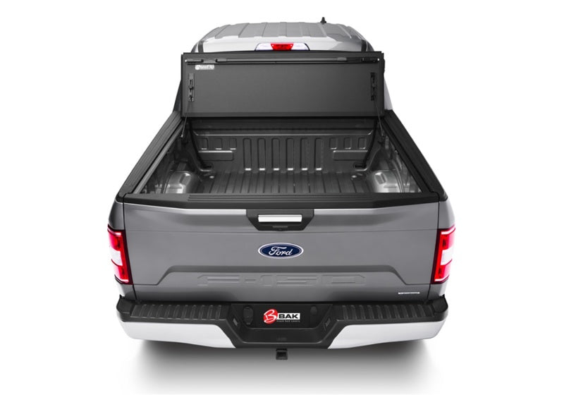 Gray 2019 ford f-150 truck bed with bakflip mx4 matte finish for 8ft bed