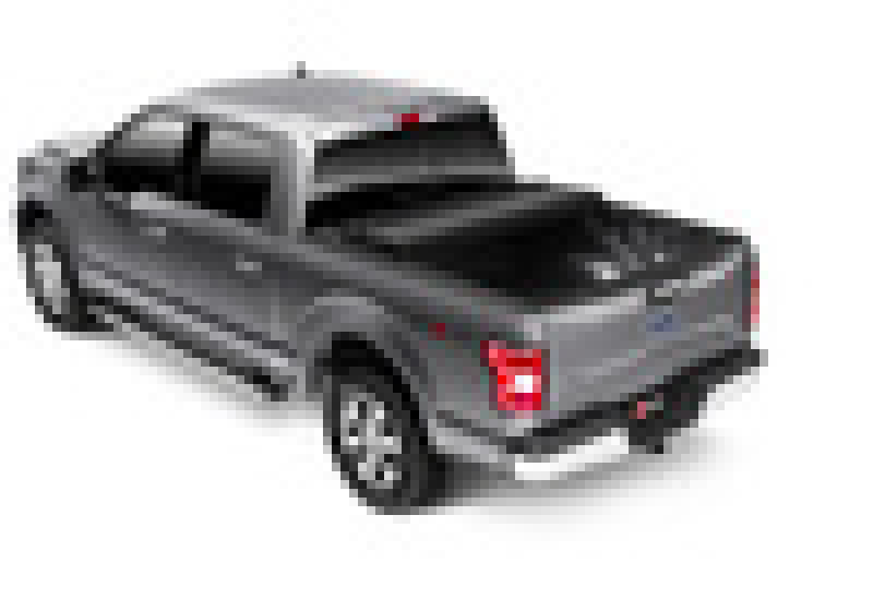 Black toy truck with red light on back displayed in bak 15-20 ford f-150 8ft bed bakflip mx4 matte finish product