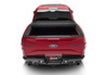 Red 2020 ford escape rear view displayed in bak revolver x4s bed cover