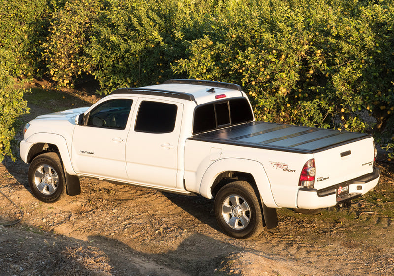 Bak 16-20 nissan titan 5ft 6in bed bakflip g2 truck bed in orange field