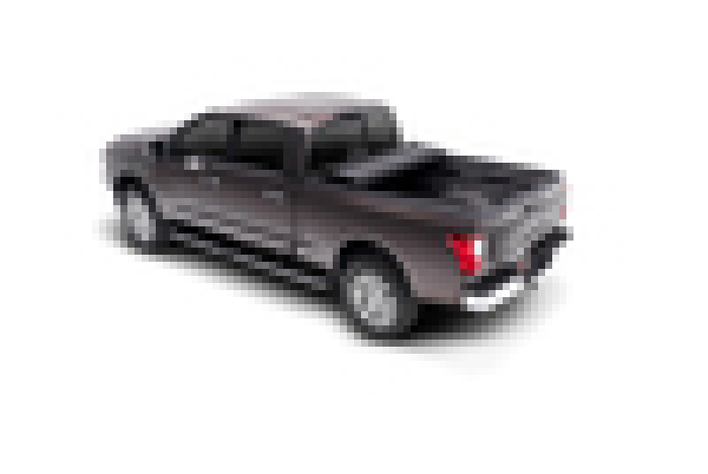 Black toy car with red light on top featured in bakflip mx4 matte finish product for nissan titan xd bed