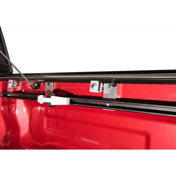 Truck bed door latch attached to handle in BAK 16-20 Toyota Tacoma 5ft Bed BAKFlip G2 product.